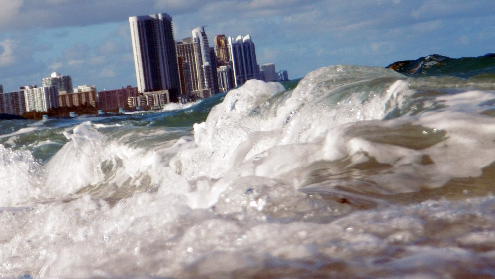 Buildings are seen near the ocean as reports indicate that Miami-Dade County could be one of the most susceptible places when it comes to rising water levels due to global warming, on March 14, 2012 in North Miami, Florida. (Photo by Joe Raedle/Getty)