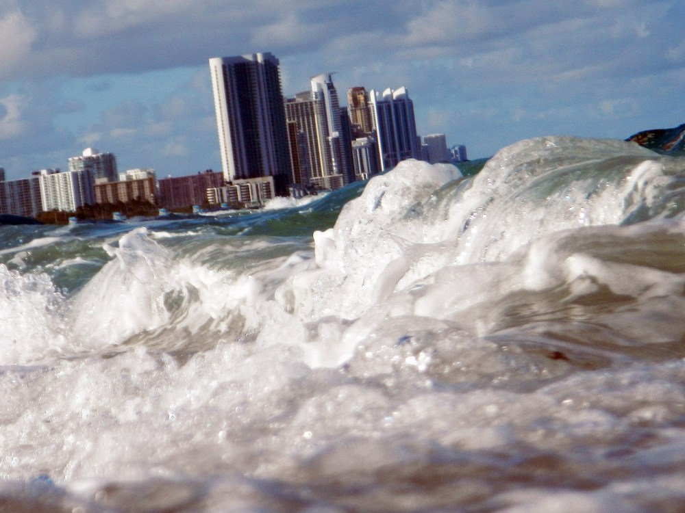 File Photo: Buildings are seen near the ocean as reports indicate that Miami-Dade County in the future could be one of the most susceptible places when it comes to rising water levels due to global warming on March 14, 2012 in North Miami, Florida....