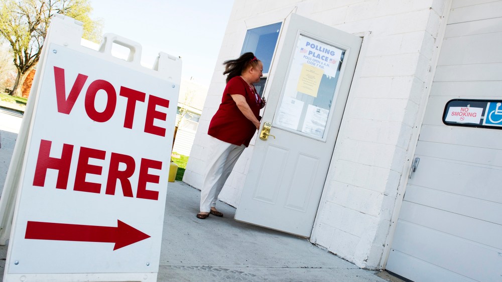 A Voter enters the fire station polling place in Magnolia, Illinois,  March 20, 2012.