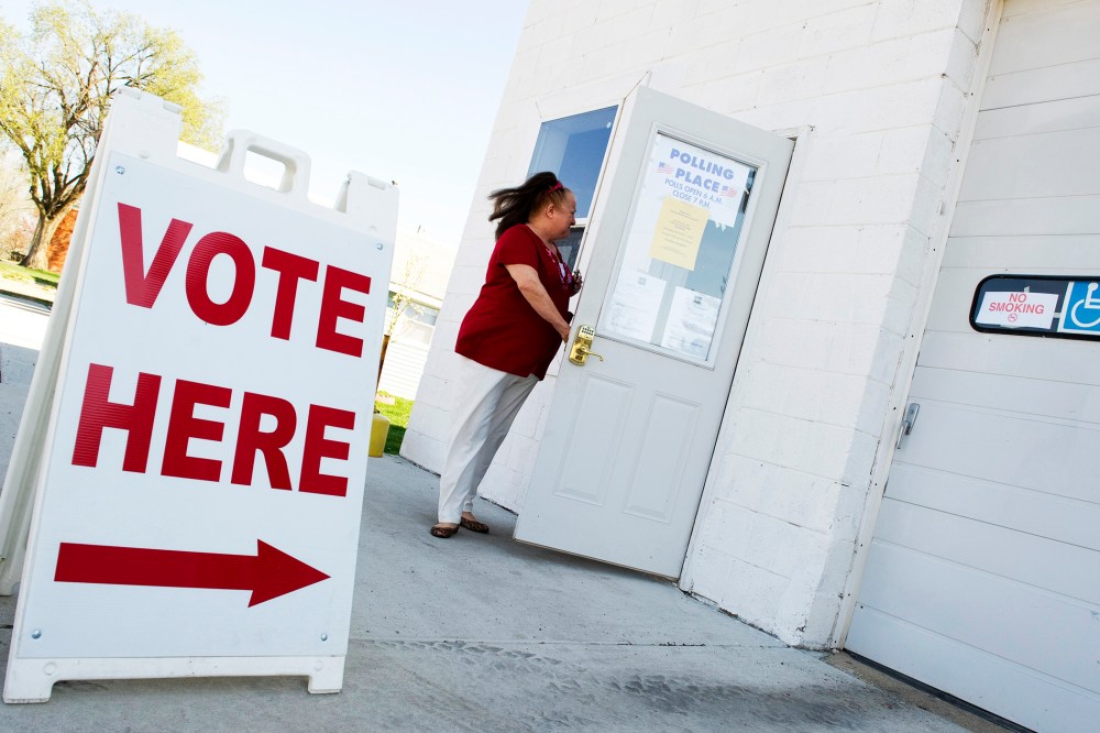 A Voter enters the fire station polling place in Magnolia, Illinois,  March 20, 2012.
