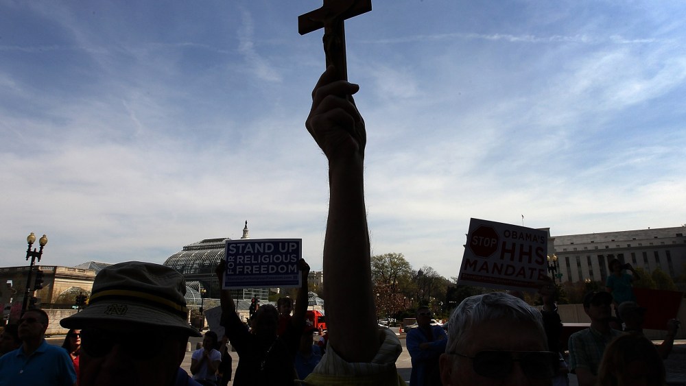 Protesters participate in a "Stand Up for Religious Freedom" rally on March 23, 2012 in Washington, DC. (Photo by Win McNamee/Getty)
