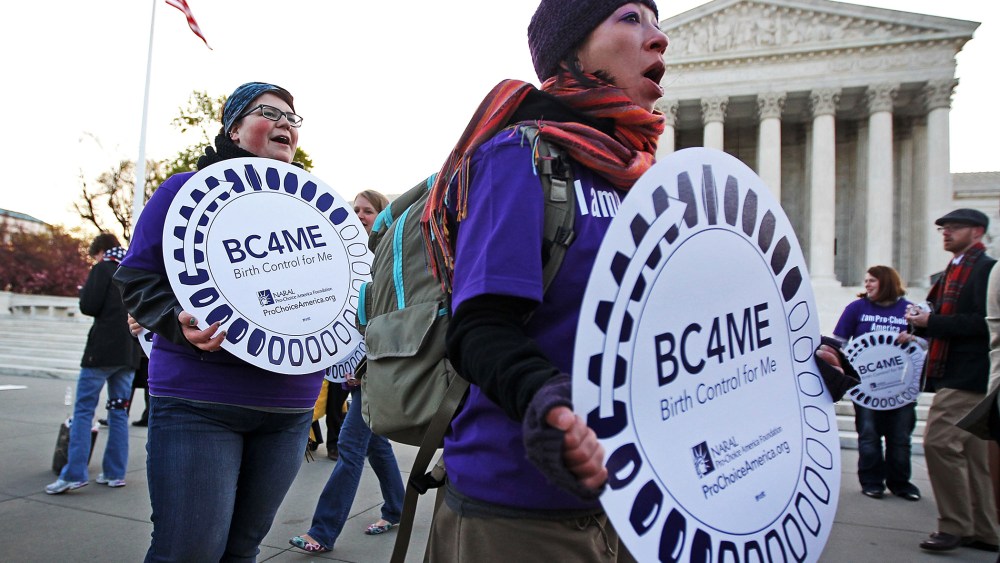 Pro-Obamacare supporters in front of the U.S. Supreme Court, March 27, 2012.