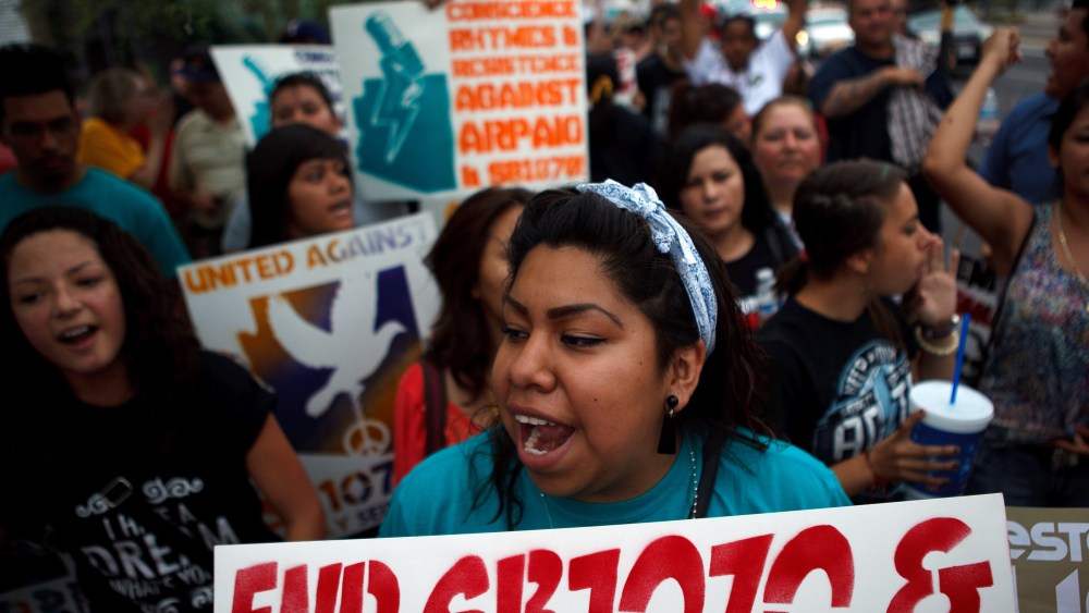 Protesting Arizona's Immigration Law SB 1070 in Phoenix, April 25, 2012. (Photo by Jonathan Gibby/Getty Images, File)