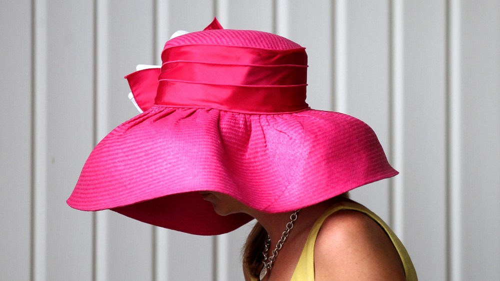 Hats like this one from May 5, 2012 may be popular at the Kentucky Derby at Churchill Downs, but all hat and no cattle may make it difficult for Mitch McConnell to win the votes of Kentucky women.