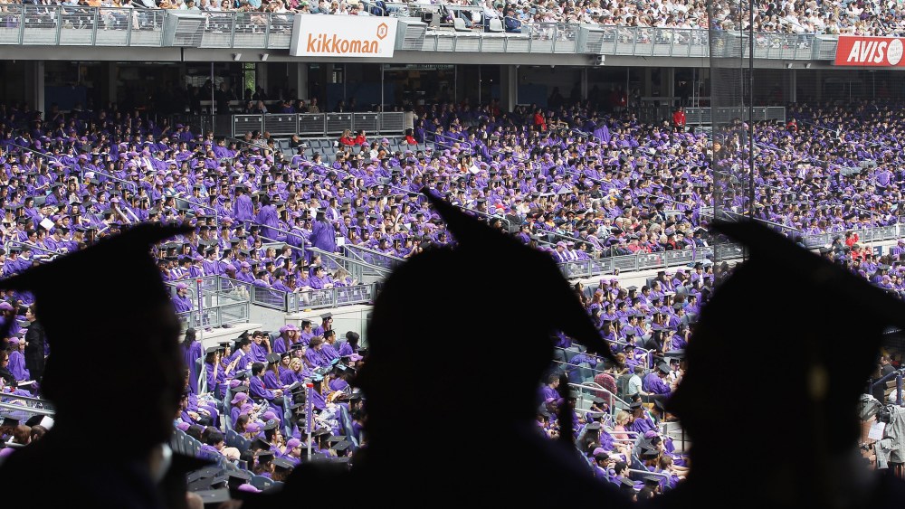 Graduating students attend New York University's commencement ceremony, May 16, 2012 in New York, N.Y.