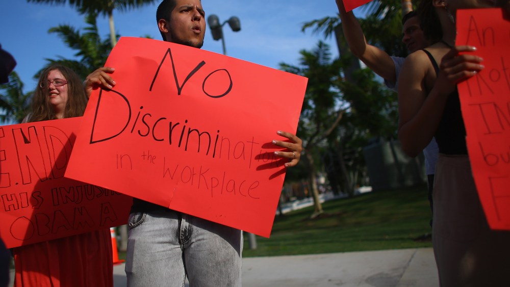 LGBT Activists Protest Workplace Discrimination Outside Obama Fundraiser