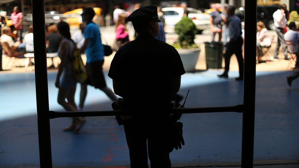 Police stand guard in New York, N.Y. (Photo by Spencer Platt/Getty)