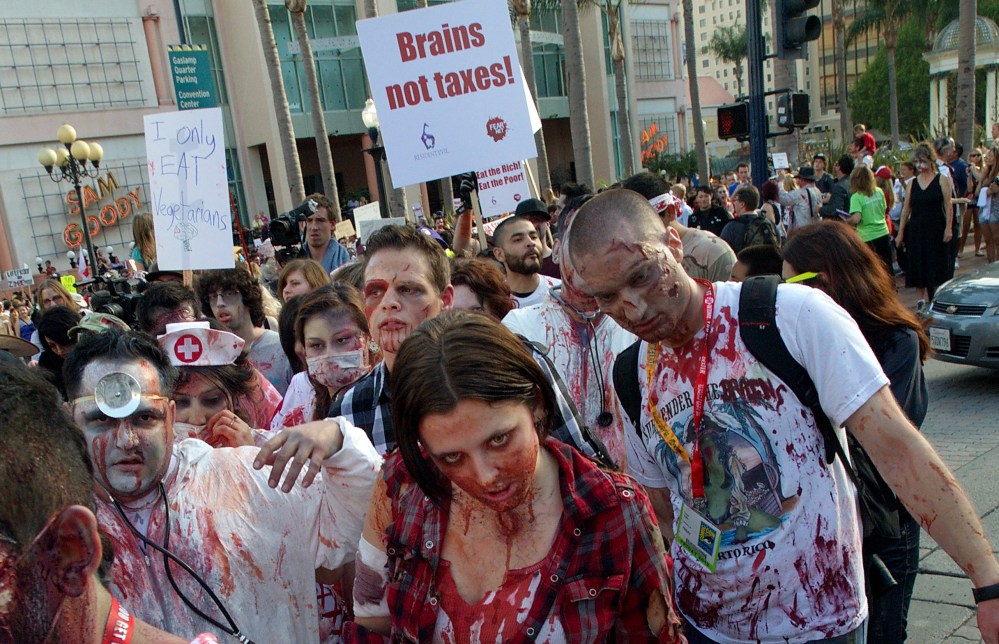 Fans participate in ''Zombie Walk: San Diego'' during Comic-Con International 2012 on July 13, 2012 in San Diego.