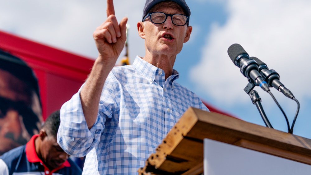 Senator Rick Scott speaks at a Herschel Walker campaign event on Oct. 11 in Carrollton, Ga.
