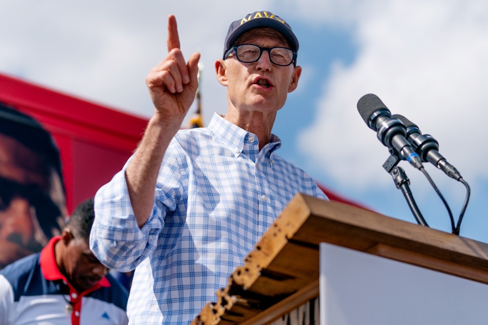Senator Rick Scott speaks at a Herschel Walker campaign event on Oct. 11 in Carrollton, Ga.