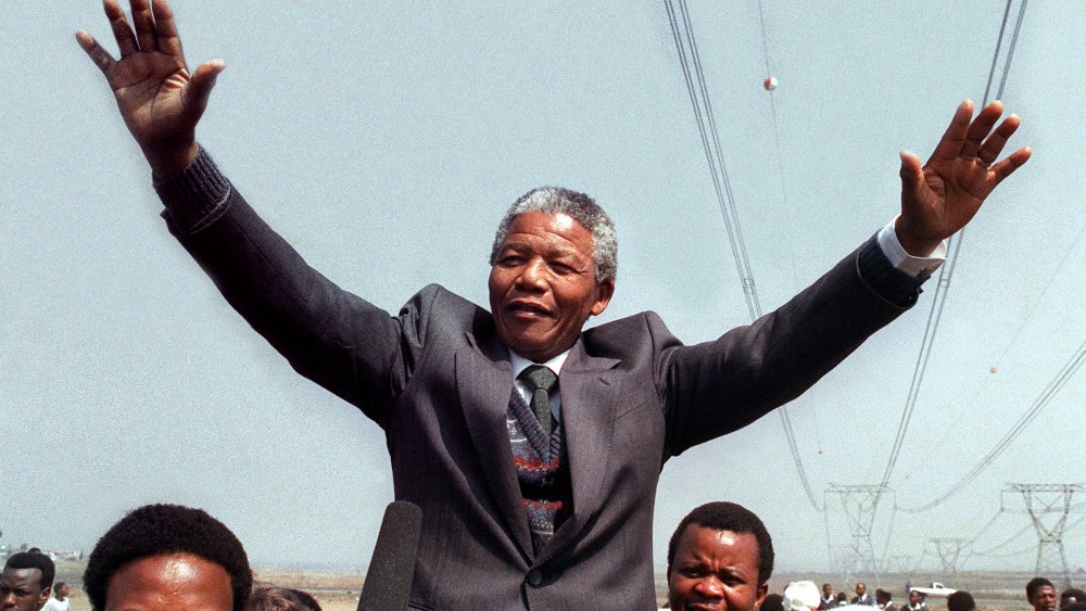 Nelson Mandela salutes supporters on Sept. 5, 1990 in Tokoza, South Africa.