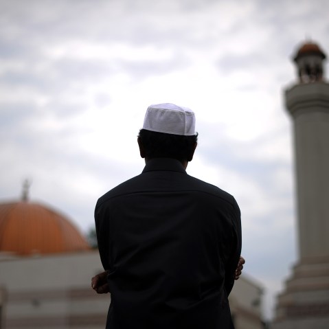 A man takes part in a special morning prayer at a mosque. (Photo by Jewel Samad/AFP/Getty)