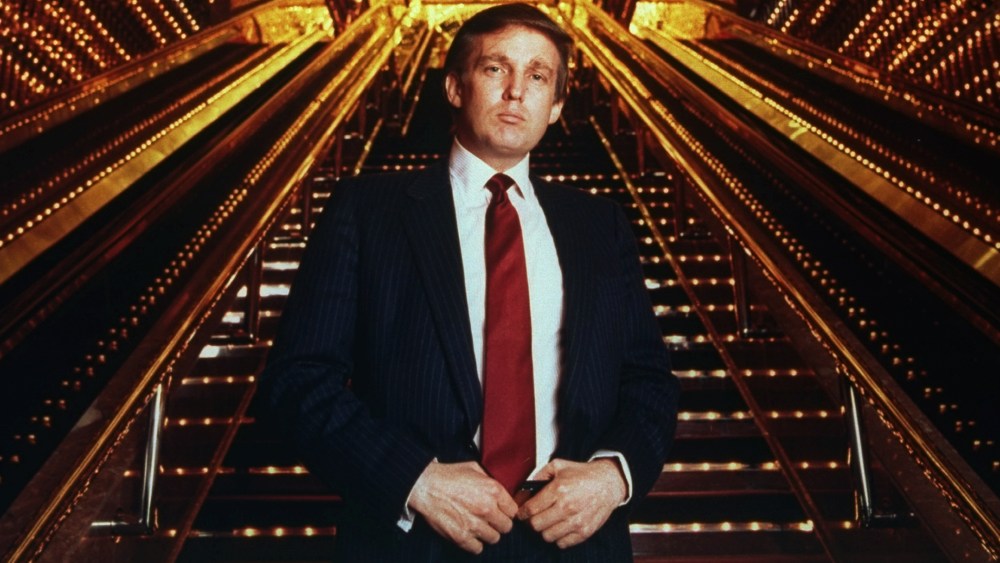 Real estate tycoon Donald Trump poses in Trump Tower atrium, 1989. (Photo by Ted Thai/The LIFE Picture Collection/Getty)
