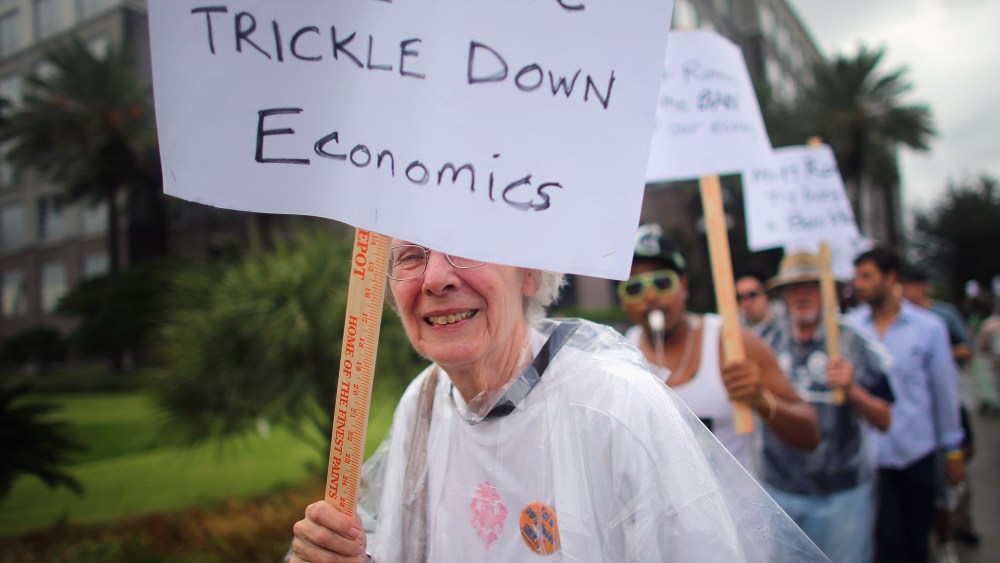 File Photo: Protesters demonstrate in front of the Bain Capital owned Bloomin' Brand Corporate Headquarters before the start of the Republican National Convention at the Tampa Bay Times Forum on August 27, 2012 in Tampa, Florida. Bain Capital was led...