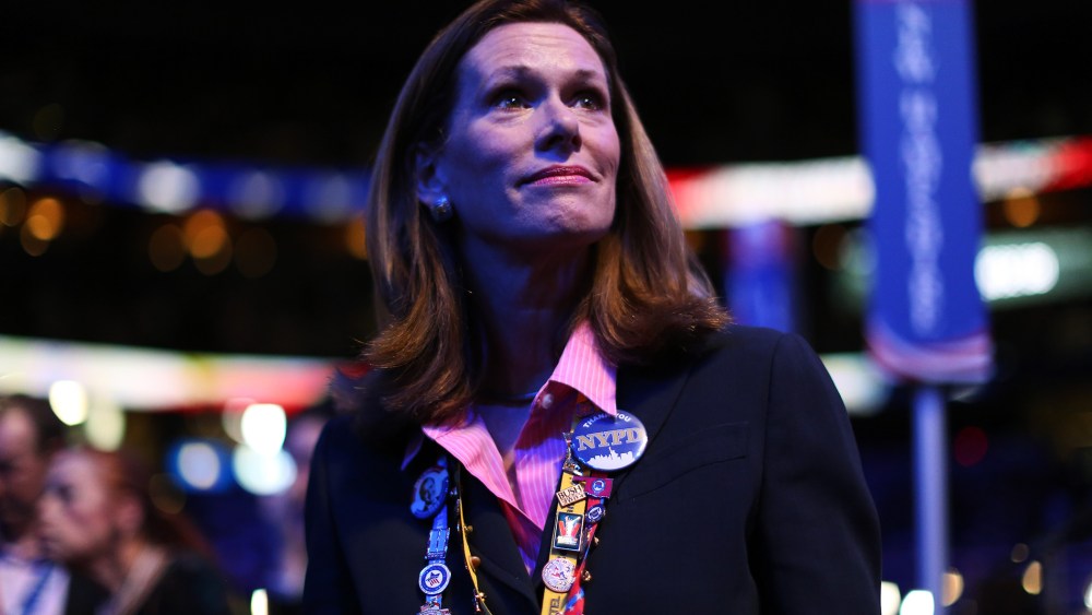 A woman watches the program during the third day of the Republican National Convention in Tampa, August 29, 2012.