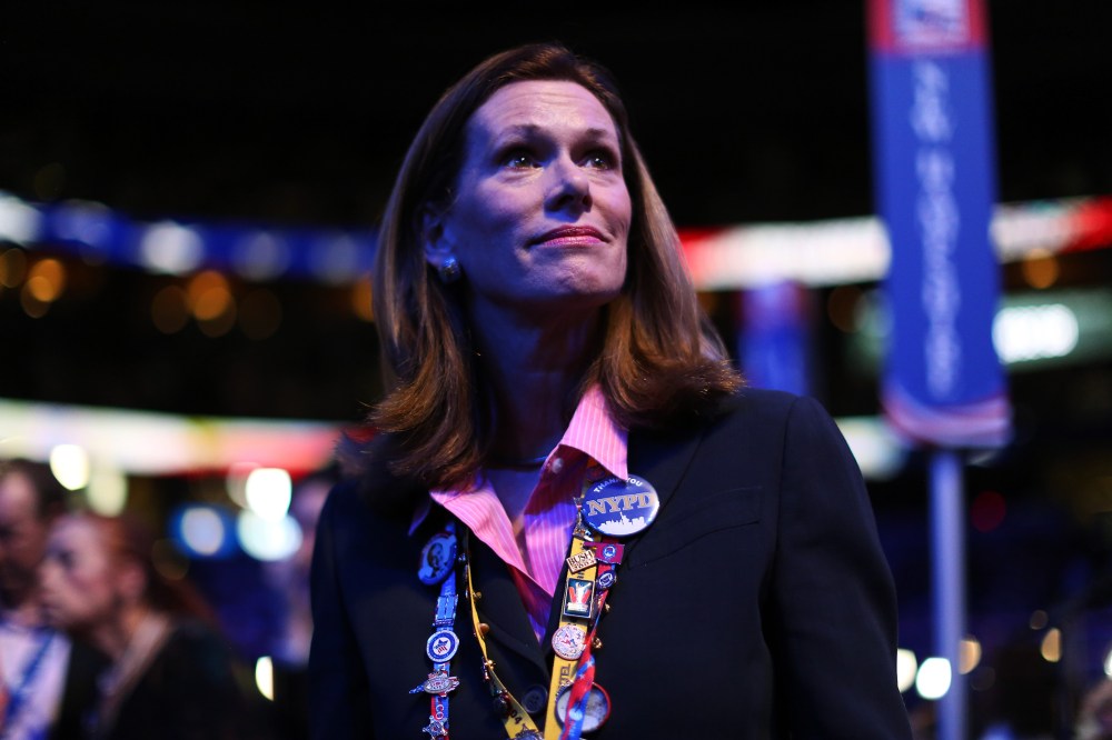 A woman watches the program during the third day of the Republican National Convention in Tampa, August 29, 2012.