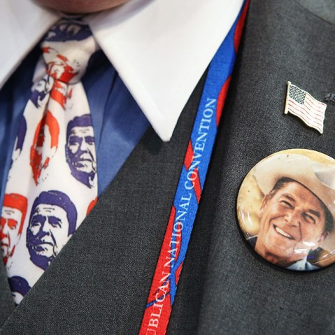 A convention-goer wears a former President Ronald Reagan button and tie during the final day of the Republican National Convention at the Tampa Bay Times Forum on August 30, 2012 in Tampa, Florida. (Photo by Chip Somodevilla/Getty Images)