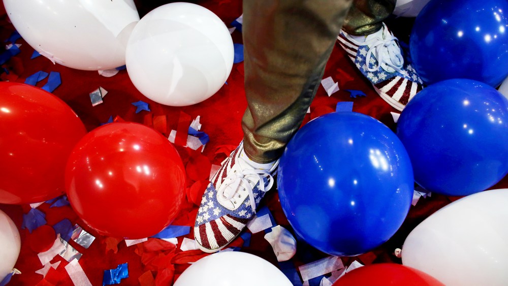 A person stands in balloons at the Republican National Convention in Tampa, Aug. 30, 2012.