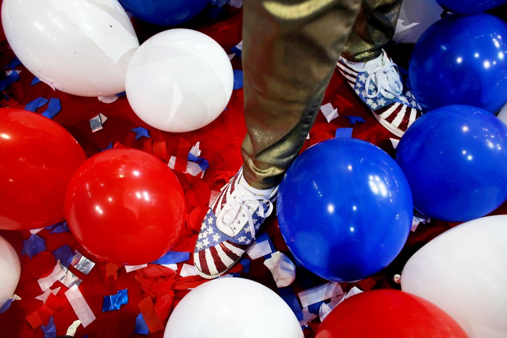 A person stands in balloons at the Republican National Convention in Tampa, Aug. 30, 2012.