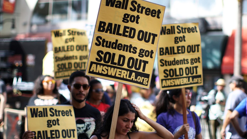 Students protest the rising costs of student loans for higher education on Hollywood Boulevard on Sept. 22, 2012 in Los Angeles, Calif. (Photo by David McNew/Getty)