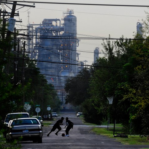 Oil facilities loom in the background of  Port Arthur, Texas, which is the end of the line for oil that would travel through the proposed Keystone XL Pipeline.