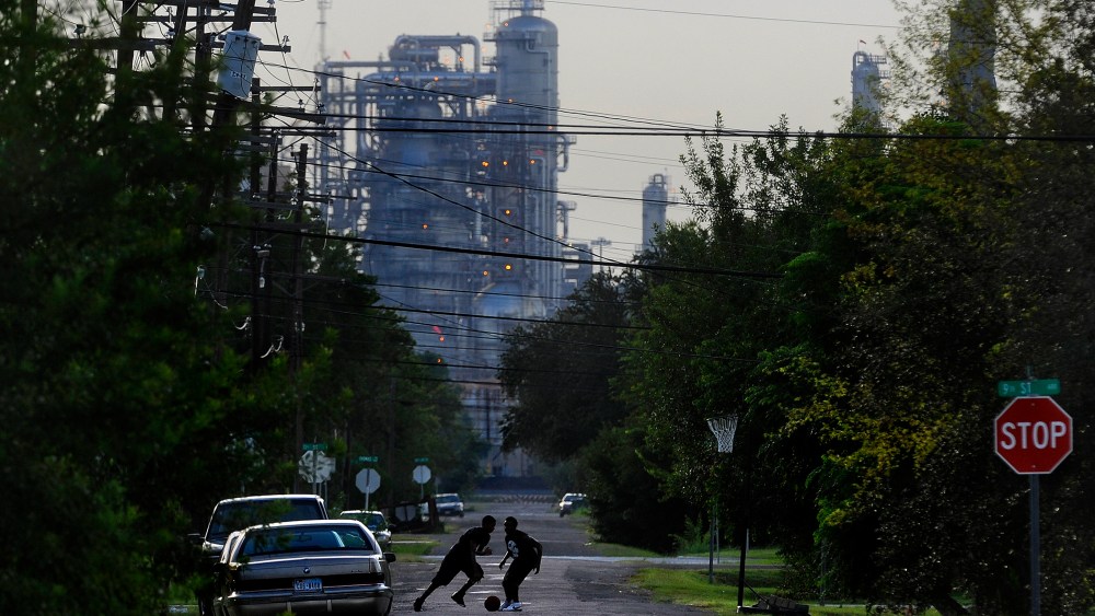 Oil facilities loom in the background of  Port Arthur, Texas, which is the end of the line for oil that would travel through the proposed Keystone XL Pipeline.