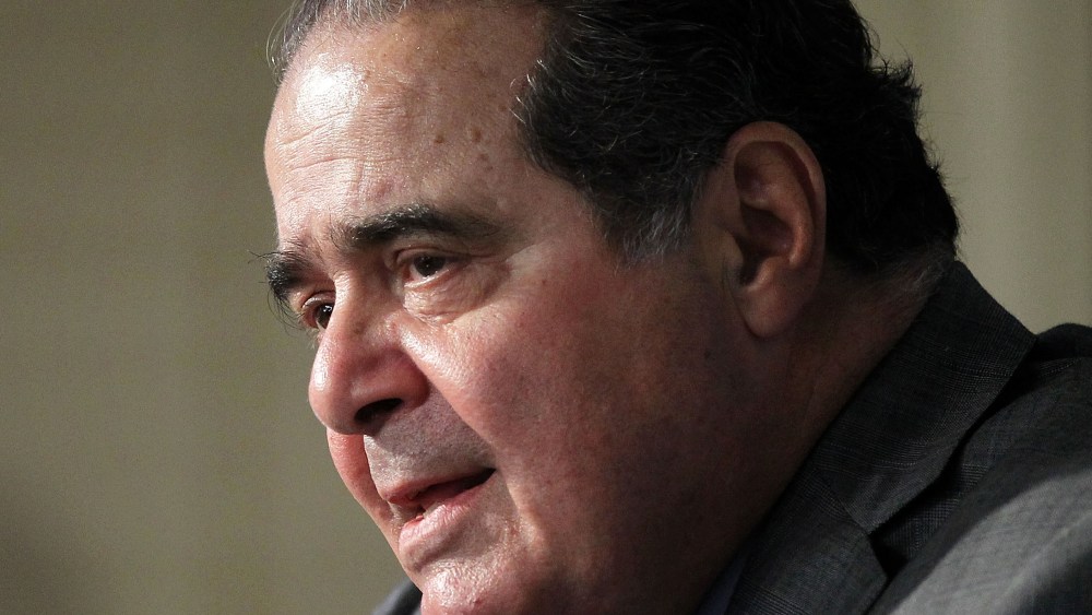 File photo: U.S. Supreme Court Justice Antonin Scalia speaks at the American Enterprise Institute in Washington, D.C. on October 2, 2012. (File Photo by Alex Wong/Getty Images)