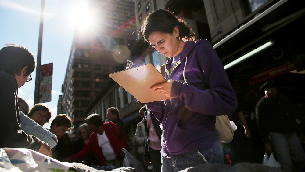 Menucha Goldstein registers to vote in New York, Oct. 10, 2012.