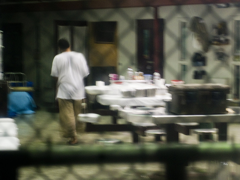 This image reviewed by the US military shot through a one way mirror shows a detainee in Cell Block B of the "Camp Six" detention facility of the Joint Detention Group at the US Naval Station in Guantanamo Bay, Cuba, January 19, 2012.  (Photo by Jim...