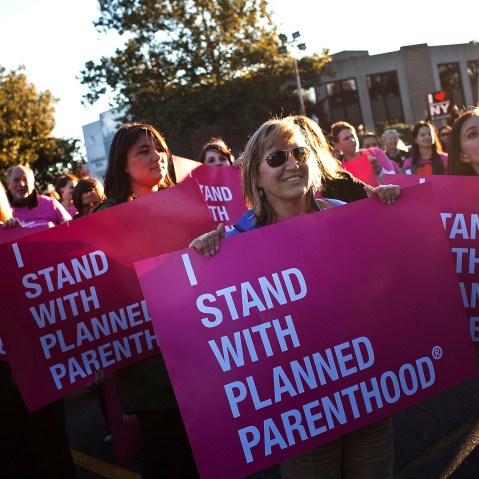 Women protest for continued funding of Planned Parenthood outside Hofstra University prior to the second presidential debate on October 16, 2012 in Hempstead, New York. U.S. President Barack Obama and Republican presidential candidate Mitt Romney will...
