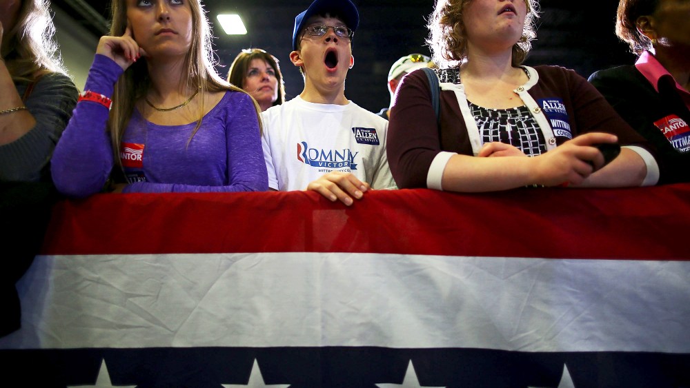 A young supporter yawns during a campaign rally for Republican vice presidential candidate Paul Ryan, October 16, 2012 in Fredericksburg, Virginia.