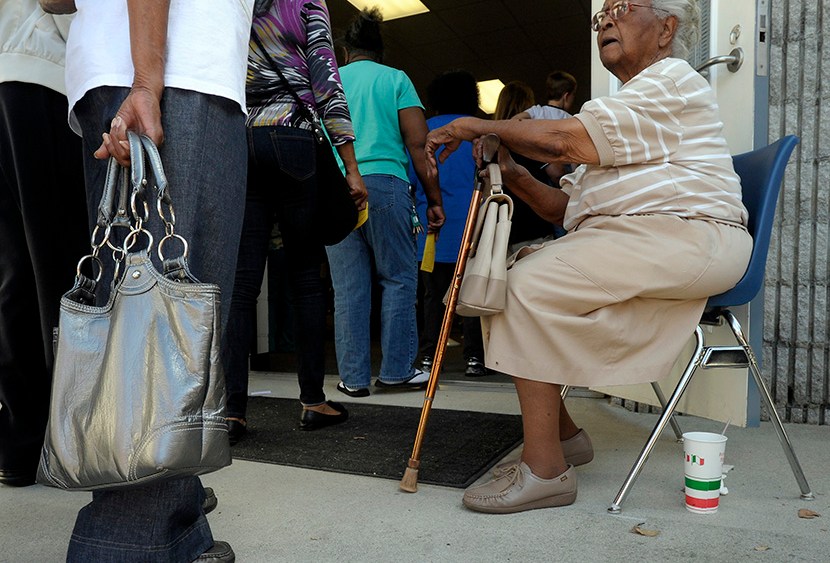 People wait in line to vote in Wilson, North Carolina, October 18, 2012.
