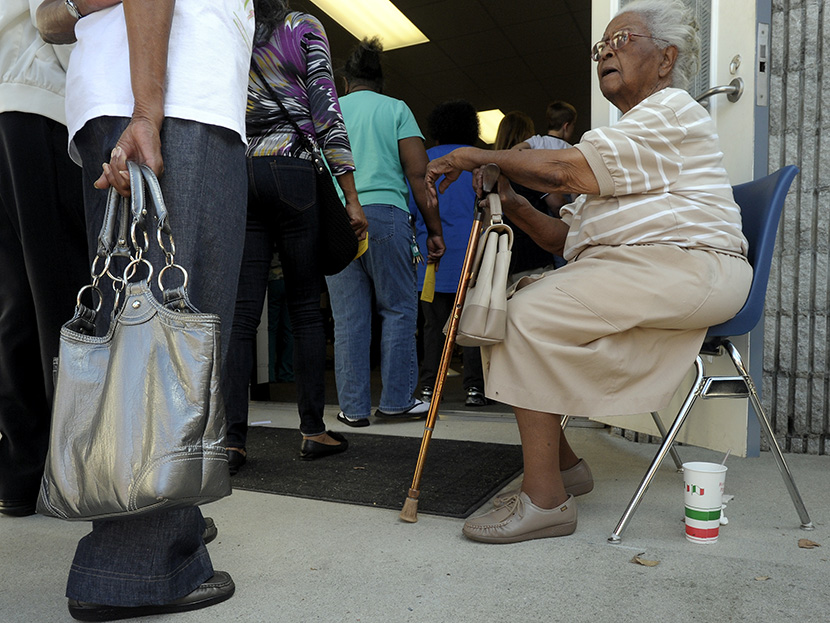 People wait in line to vote in Wilson, North Carolina, October 18, 2012.