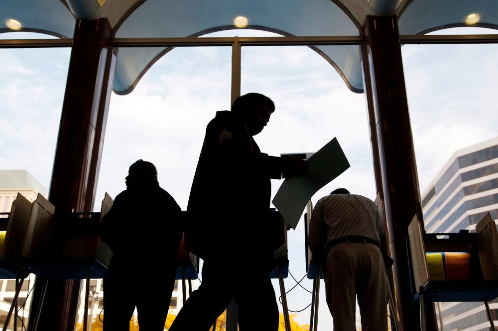Milwaukee residents cast their ballots during early voting at the Milwaukee Municipal Building Oct. 22, 2012 Milwaukee, Wis.