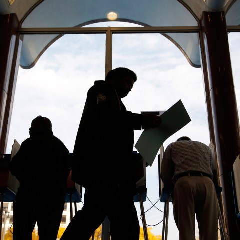 Milwaukee residents cast their ballots during early voting at the Milwaukee Municipal Building Oct., 22, 2012 Milwaukee, Wis. (Photo by Darren Hauck/Getty)