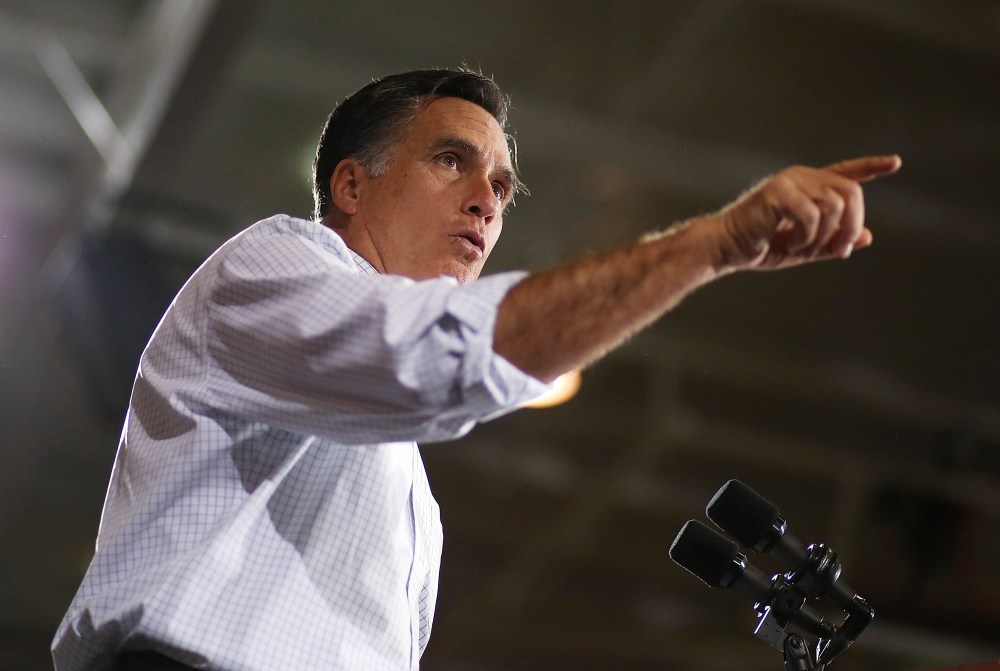 Republican presidential candidate, former Massachusetts Gov. Mitt Romney speaks during a campaign rally at Avon Lake High School on Oct. 29 in Avon Lake, Ohio. A new poll shows him five points behind Obama in the Buckeye State. (Photo by Justin...