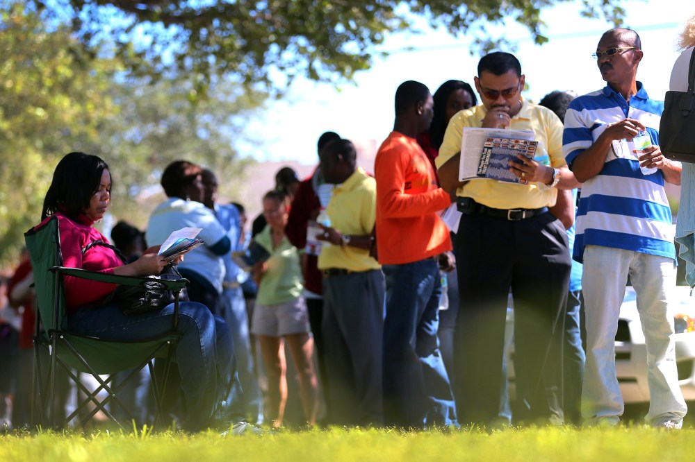 People wait in line to vote at the North Miami Public Library on Nov. 1, 2012 in North Miami, Fl.