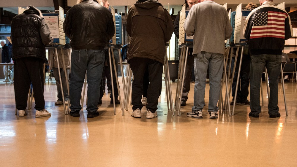 People vote at the United Auto Workers Local 1250 Hall during election day Nov. 6, 2012 in Cleveland, Ohio. (Photo by Brendan Smialowski/AFP/Getty)