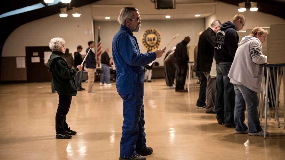 People wait as others vote at the United Auto Workers Local 1250 Hall during election day November 6, 2012 in Cleveland, Ohio.