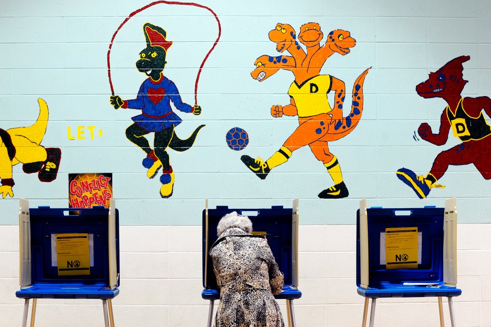 A voter casts her ballot in the gymnasium of Douglas Elementary School on Nov. 6, 2012 in Raleigh, N.C