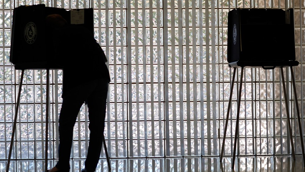 A voter casts her ballot on Nov. 6, 2012 in Mansfield, Texas.