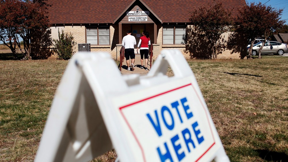 Voters exit a polling location after voting on November 6, 2012 in Lipan, Texas.