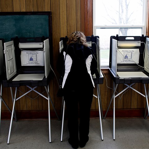 A woman casts her vote at a polling station on Nov. 6, 2012 in Sugar Creek, Wisconsin.