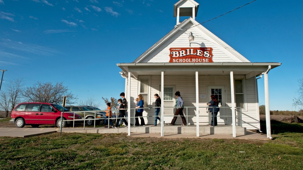 The Eads family leaves after watching their mother Suzie Eads vote at Briles Schoolhouse on November 5, 2012 in Wellsville, Kansas.