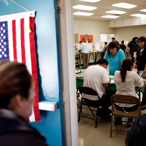: People vote at a polling place in the East L.A. area during the U.S. presidential election on Nov. 6, 2012 in Los Angeles.
