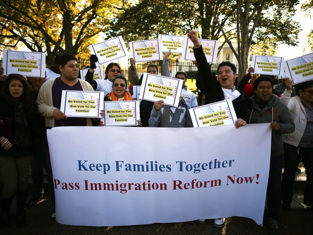 Latinos and immigrants participate in a rally on immigration reform in front of the White House on Nov. 8, 2012, in Washington, D.C. (Photo by Mark Wilson/Getty Images)