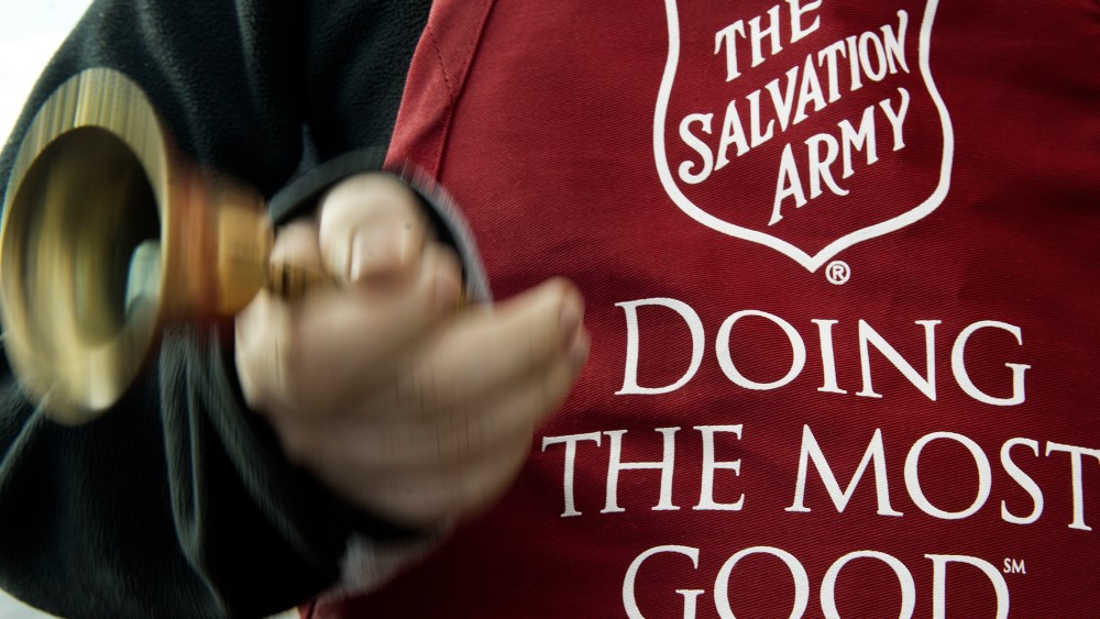 A Salvation Army volunteer rings the collection bell on November 24, 2012.