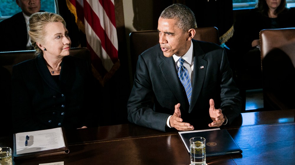 U.S. President Barack Obama (C) speaks as U.S. Secretary of State Hillary Clinton (L) and U.S. Secretary of Defense Leon Panetta listen at a cabinet meeting at the White House on November 28, 2012 in Washington, DC.
