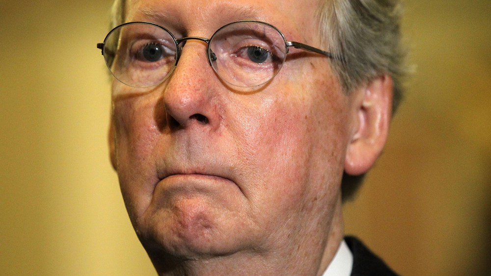 File Photo:  U.S. Senate Minority Leader Sen. Mitch McConnell (R-KY) listens during a news briefing after the weekly Senate Republican Policy Luncheon December 11, 2012 on Capitol Hill in Washington, DC. McConnell discussed various topics with the...
