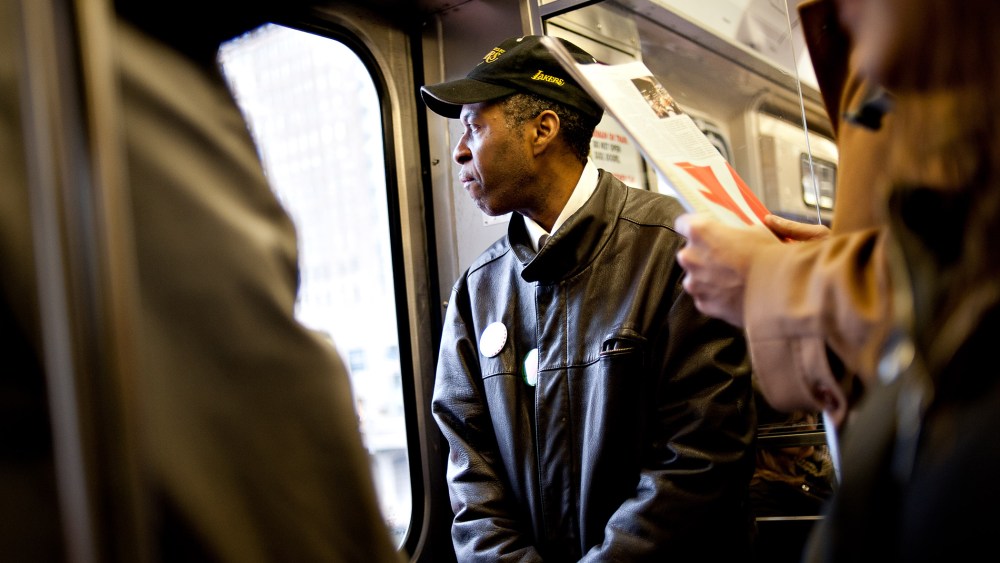 Tyree Johnson, a 20-year McDonald's employee making minimum wage, rides a train on his way to work in Chicago, Illinois, U.S., on Nov. 26, 2012.
